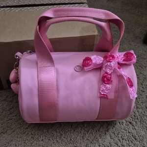 Lululemon Athletica Pink Mini Bag with Floral Accent